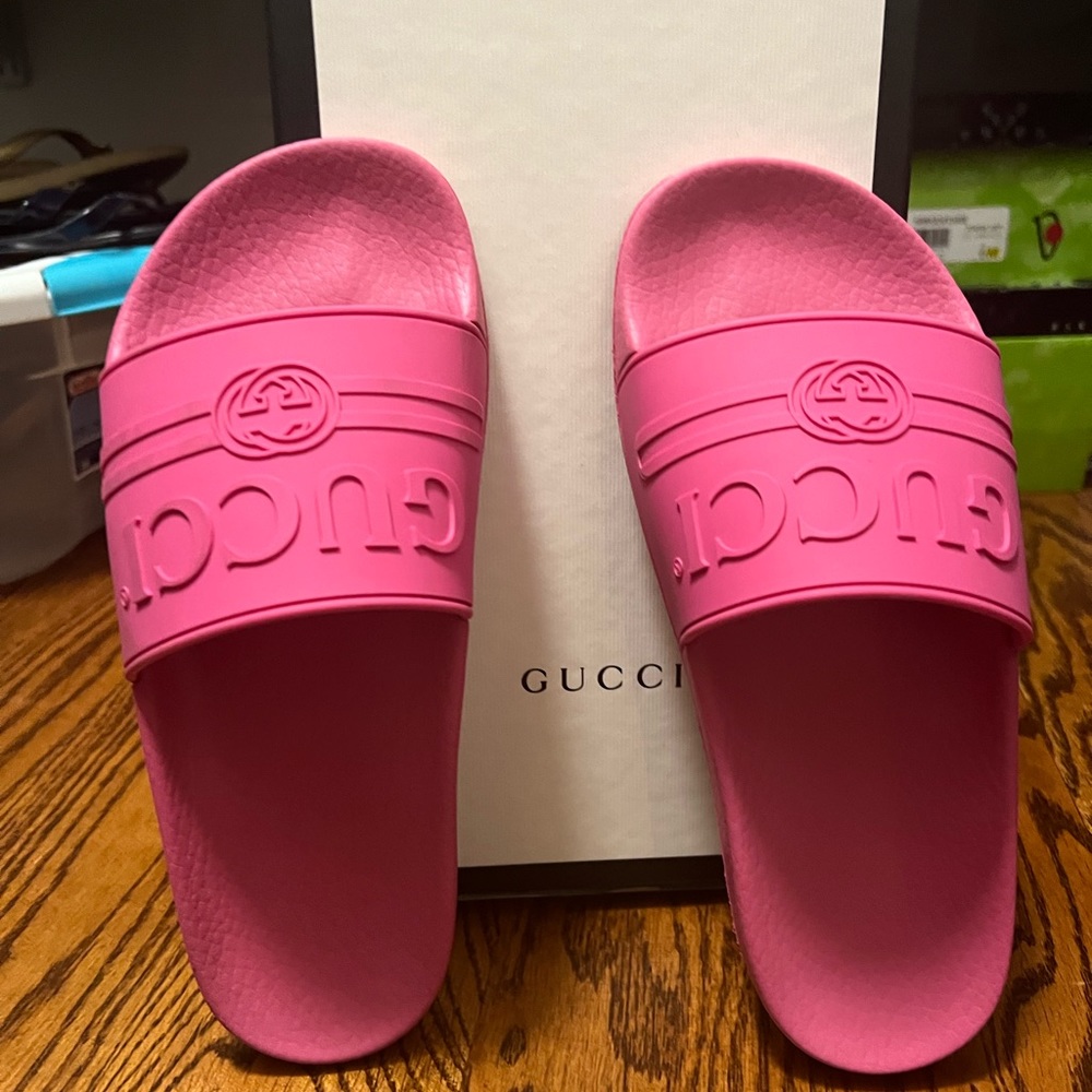 Gucci slides size 37, worn twice , small black scuff shown in second picture